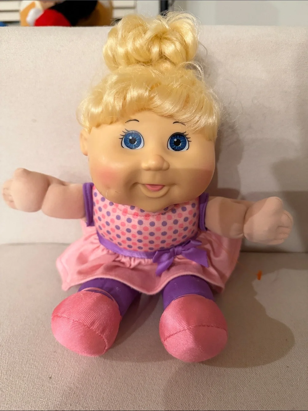 Cabbage Patch Kids touch smiling